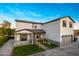 Modern two-story home with metal roof and landscaping at 3322 N Valencia Ln, Phoenix, AZ 85018