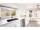 Modern kitchen sink with a view of the mountain at 3433 E Francisco Dr, Phoenix, AZ 85042