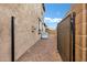 Backyard with gravel, gate, and side yard at 3457 E Virgil Dr, Gilbert, AZ 85298
