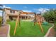 Fun backyard with grassy area, playground, and swings for  at 3457 E Virgil Dr, Gilbert, AZ 85298