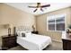 Cozy bedroom with a neutral color scheme and ample natural light at 3457 E Virgil Dr, Gilbert, AZ 85298