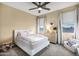 Bright bedroom with queen bed and plenty of natural light at 3457 E Virgil Dr, Gilbert, AZ 85298