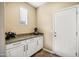 Bright butler's pantry with granite countertops and white cabinets at 3457 E Virgil Dr, Gilbert, AZ 85298