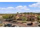 Community clubhouse with Spanish-style architecture and ample parking at 3457 E Virgil Dr, Gilbert, AZ 85298