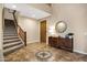 Bright entryway with a wooden console table and a large mirror at 3457 E Virgil Dr, Gilbert, AZ 85298