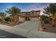 Two-story home with a large driveway and mature landscaping at 3457 E Virgil Dr, Gilbert, AZ 85298