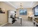 Spacious home office with built-in shelving and desk at 3457 E Virgil Dr, Gilbert, AZ 85298