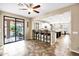 Open kitchen features granite counters, stainless steel appliances, and breakfast bar at 3457 E Virgil Dr, Gilbert, AZ 85298