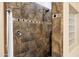 Large walk-in shower with tile surround and glass block accents at 3457 E Virgil Dr, Gilbert, AZ 85298