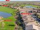 Aerial view of a luxury home community near a golf course at 36709 N Stoneware Dr, San Tan Valley, AZ 85140
