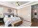 Spacious Primary bedroom with plush bedding and large windows at 36709 N Stoneware Dr, San Tan Valley, AZ 85140