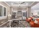 Bright and spacious home office with built-in shelves and large desk at 36709 N Stoneware Dr, San Tan Valley, AZ 85140
