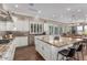 Gourmet kitchen boasting granite countertops, stainless steel appliances, and an eat-in island at 36709 N Stoneware Dr, San Tan Valley, AZ 85140
