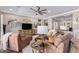 Open concept living room featuring comfortable seating and southwestern decor at 36709 N Stoneware Dr, San Tan Valley, AZ 85140