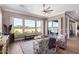 Cozy sitting area with comfortable seating and access to the patio at 36709 N Stoneware Dr, San Tan Valley, AZ 85140
