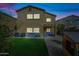 Two-story home with a backyard, patio, and playset at 3743 W Wayne Ln, Anthem, AZ 85086