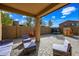 Spacious backyard with patio furniture and play structures at 3743 W Wayne Ln, Anthem, AZ 85086