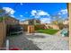 Backyard with patio, play area, and artificial turf at 3743 W Wayne Ln, Anthem, AZ 85086