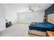 Bright bedroom with a ceiling fan and plush carpeting at 3743 W Wayne Ln, Anthem, AZ 85086