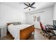 Bedroom with wood flooring, window seating and a workspace at 3743 W Wayne Ln, Anthem, AZ 85086