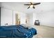 Spacious bedroom with comfy bed and ceiling fan at 3743 W Wayne Ln, Anthem, AZ 85086