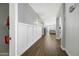Bright hallway with hardwood floors and wainscoting at 3743 W Wayne Ln, Anthem, AZ 85086