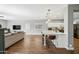 Modern kitchen with white cabinets and an island at 3743 W Wayne Ln, Anthem, AZ 85086