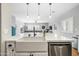 Farmhouse sink and open concept kitchen design at 3743 W Wayne Ln, Anthem, AZ 85086