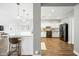Modern kitchen with white cabinets, large island, and stainless steel appliances at 3743 W Wayne Ln, Anthem, AZ 85086