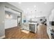 Open concept kitchen with island and farm sink at 3743 W Wayne Ln, Anthem, AZ 85086