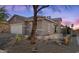 Single-story home with neutral exterior and desert landscaping at 40758 N Boone Ln, Anthem, AZ 85086