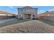 Spacious backyard with gravel landscaping and a covered patio at 4122 S 185Th Ln, Goodyear, AZ 85338