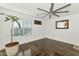 Spacious bedroom with hardwood floors and a ceiling fan at 4122 S 185Th Ln, Goodyear, AZ 85338