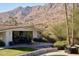 Spacious patio with fire pit and mountain backdrop at 4630 E Mockingbird Ln, Paradise Valley, AZ 85253