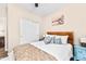 Cozy bedroom featuring a wood-framed bed and light walls at 5418 S Emerald Desert Dr, Gold Canyon, AZ 85118