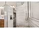 Walk-in shower with pebble floor and modern tile at 5418 S Emerald Desert Dr, Gold Canyon, AZ 85118