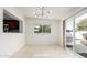 Bright dining area with sliding glass doors leading to the backyard at 628 E Calavar Rd, Phoenix, AZ 85022