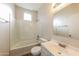 Clean bathroom with a tub, toilet and vanity at 6314 W Virginia Ave, Phoenix, AZ 85035