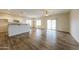 Kitchen with granite countertops, white cabinets, and stainless steel appliances at 6314 W Virginia Ave, Phoenix, AZ 85035