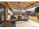 Backyard patio with fire pit and seating area at 6433 W Cortez St, Glendale, AZ 85304