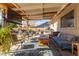 Covered patio with seating area and view of backyard at 6433 W Cortez St, Glendale, AZ 85304