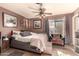 Bedroom with queen bed, ceiling fan and sliding door access at 6433 W Cortez St, Glendale, AZ 85304