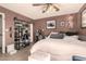 Main bedroom with a queen-size bed and ample closet space at 6433 W Cortez St, Glendale, AZ 85304