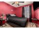 Bedroom with a double bed and dark-colored bedding at 6433 W Cortez St, Glendale, AZ 85304
