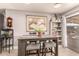 Kitchen nook with table, chairs, and built-in shelving at 6433 W Cortez St, Glendale, AZ 85304