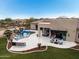 Luxury home with pool, outdoor kitchen, and expansive backyard at 9655 N 130Th St, Scottsdale, AZ 85259