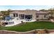 Luxury home with pool, outdoor kitchen, and expansive backyard at 9655 N 130Th St, Scottsdale, AZ 85259