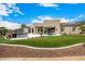 Landscaped backyard with artificial turf and pool at 9655 N 130Th St, Scottsdale, AZ 85259