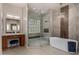 Spa-like bathroom with soaking tub and walk-in shower at 9655 N 130Th St, Scottsdale, AZ 85259