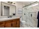 Elegant bathroom with marble shower and wood vanity at 9655 N 130Th St, Scottsdale, AZ 85259